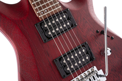 X100, corps meranti, manche érable, touche jatoba, trémolo 6 points, 2 doubles Powersound, black cherry pores ouverts