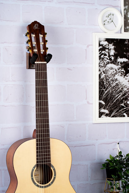 Support mural pour guitare et basse, embase bois, fixation par 2 vis, étrier (largeur: 4.5 cm) recouvert de mousse, noyer