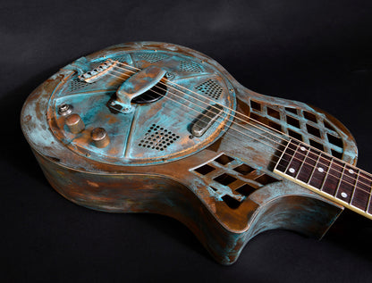 JR-994, corps en laiton"Brass Rust", manche acajou, touche palissandre, micro simple, résonateur single cone, soft case