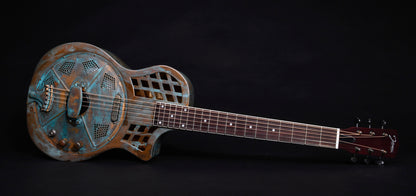 JR-994, corps en laiton"Brass Rust", manche acajou, touche palissandre, micro simple, résonateur single cone, soft case