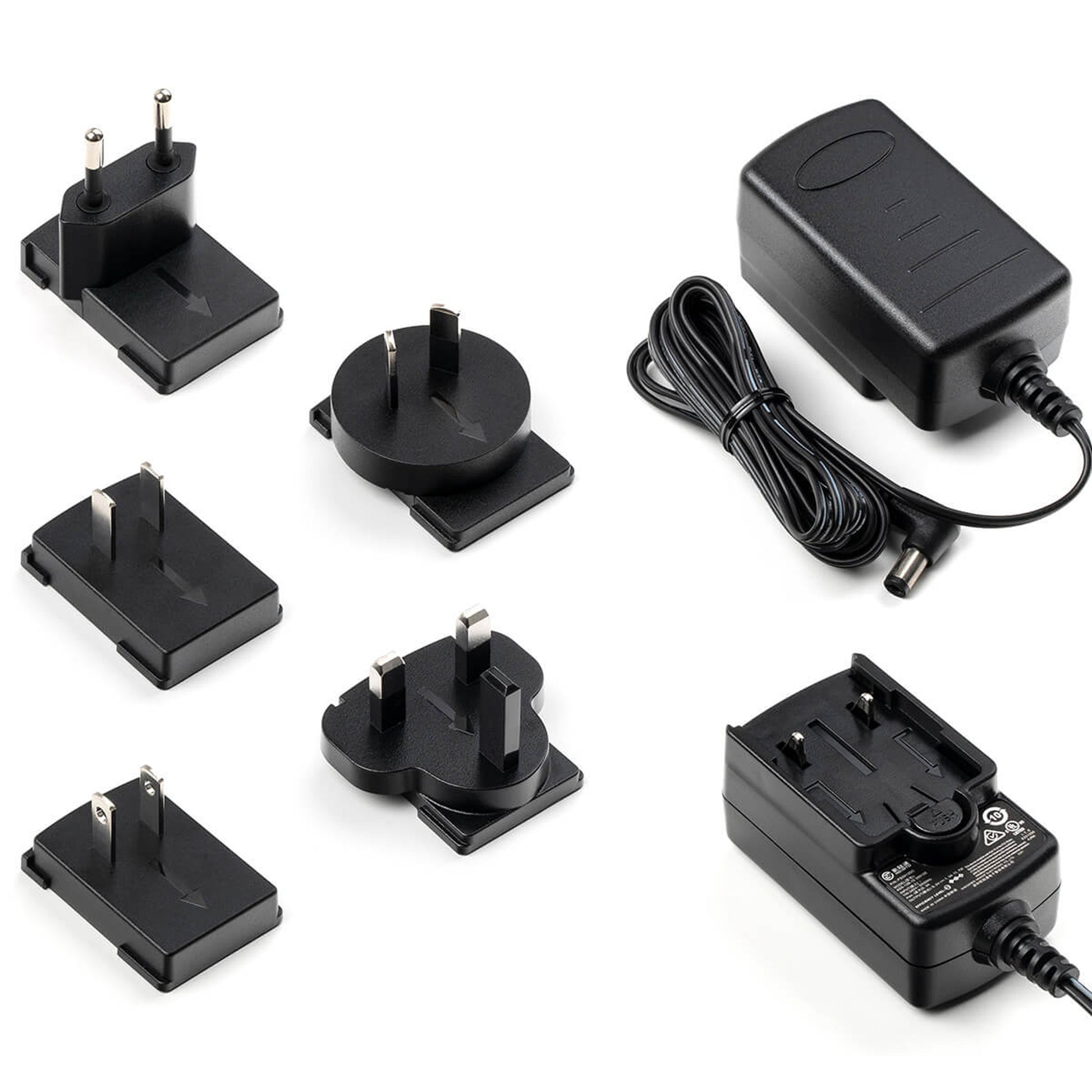 Alimentation 9V DC 1.3A, 100-240V, livrée avec cinq fiches interchangeables (EU/US/UK/CN/AU)